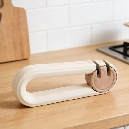 Compact hanging-type household quick knife sharpener