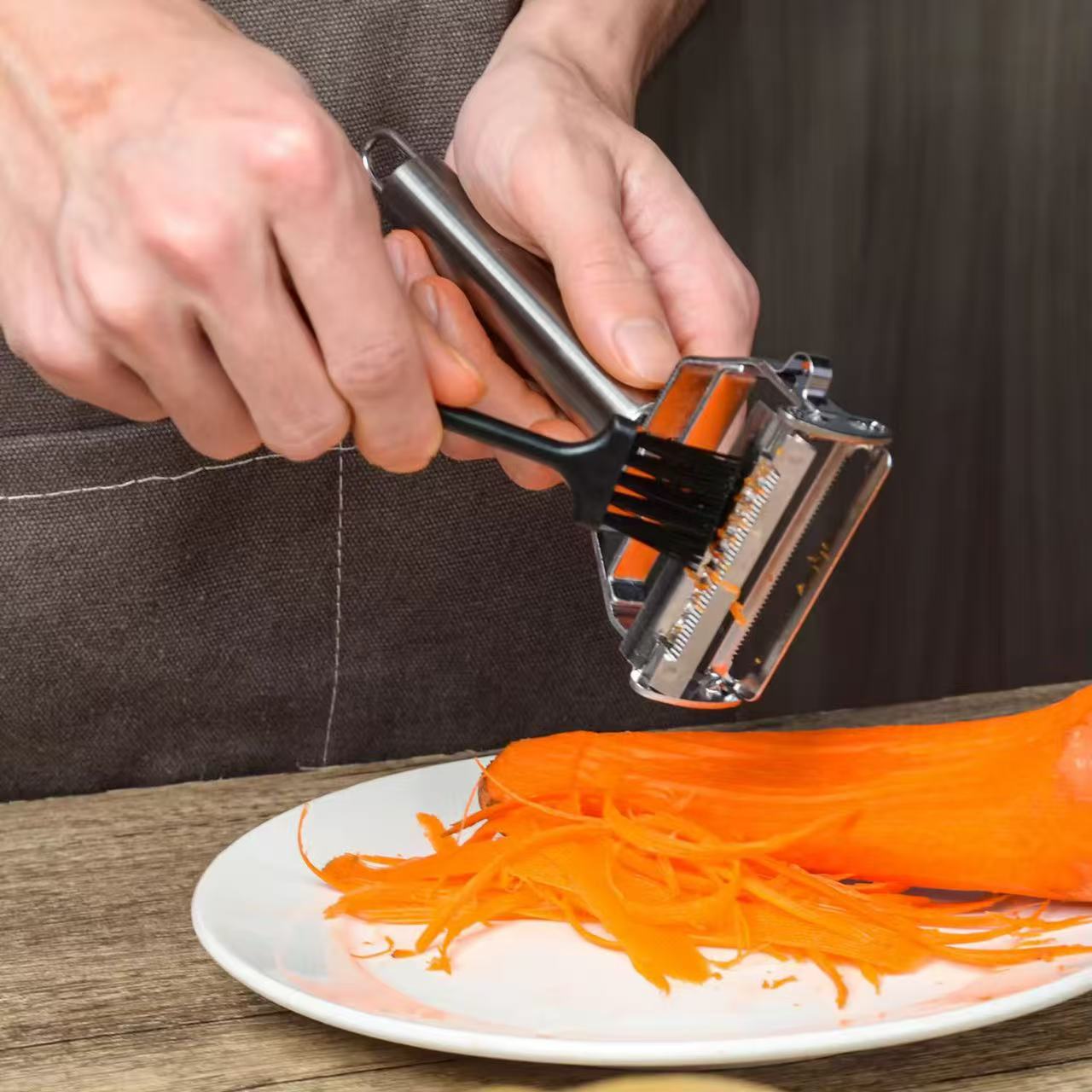 Two-in-one stainless steel peeler and shredder